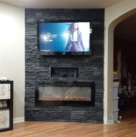 entertainment center with fireplace.